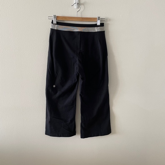 Lululemon black wide leg crop yoga pants. Size 4. White mesh detailing. - Picture 2 of 8